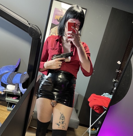 Young Femboy in Chastity and a Latex Mini Skirt